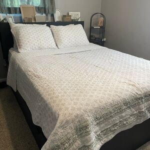 White and sage green quilt